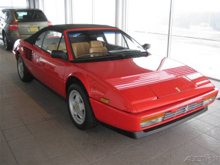 Illustration for article titled Nice Price Or Crack Pipe: 5,944-Mile Ferrari Mondia Cabriolet For $37,995?